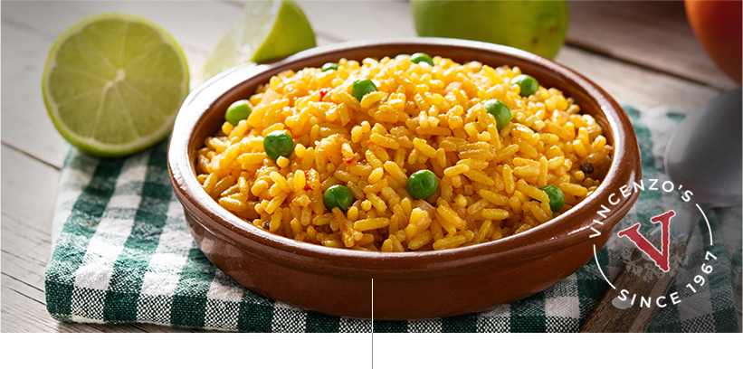 Rice in a bowl on a table with garnish